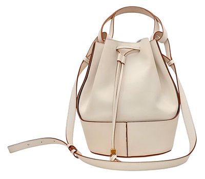 A Lowe Ivory Bucket Bag. Leather exterior with gold-toned hardware, top handle, adjustable 