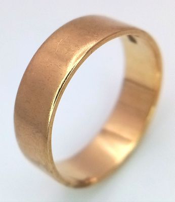 A 9K GOLD BAND RING . 2.8gms size O
