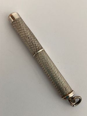 Vintage SILVER TOOTHPICK. Attractive engine turned design. Twist action. Extendable and