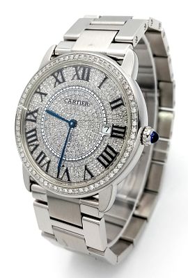 A FABULOUS CARTIER LADIES WATCH WITH PAVED DIAMOND DIAL , ROMAN NUMERALS ,SAPPHIRE CROWN AND IN