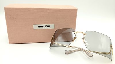 A pair of Miu Miu oversized rimless metal pale gold sunglasses. Comes with a pink velvet