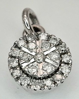 A 18k white gold diamond cluster pendant, 0.20ct diamond weight, 0.8g total weight. Ref 5798H.