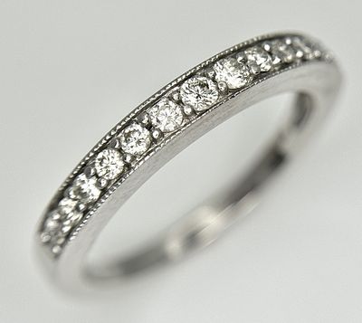 AN 18K WHITE GOLD, DIAMOND HALF ETERNITY RING. 0.25CTW , 2.9G TOTAL WEIGHT, SIZE L. REF: SC 6056