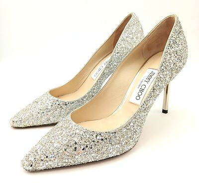 A dazzling pair of Jimmy Choo champange coarse glitter fabric pointed pumps. Size 38/UK size 5.