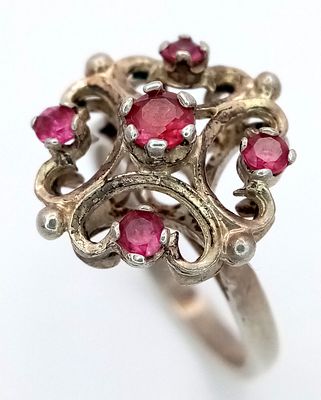 A Vintage, Hallmarked 1975, Silver and Ruby Set Ring Size K. The Ring has a French Styling