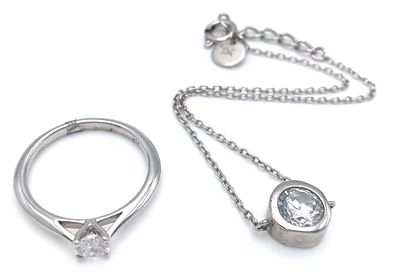 A STERLING SILVER STONE SET BRACELET. 16CM LENGTH AND STERLING SILVER SINGLE STONE SET RING