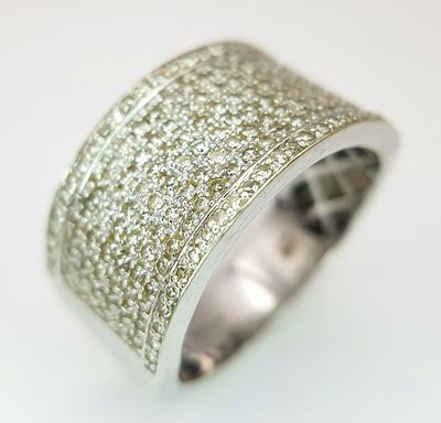 A Gorgeous 18K White Gold and Diamond Cocktail Ring. Eight rows of pave diamonds - 1ctw. 12mm