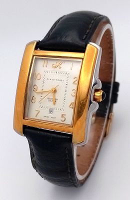 A Klaus Kobec Discretion Couture Quartz Ladies Tank Watch. 30mm case. White dial with date