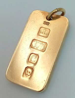 A REALLY CHUNKY 9K GOLD INGOT PENDANT . 29.5gms