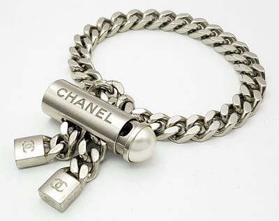 A Chanel Designer Curb Link Adjustable Bracelet. Sterling silver. Comes with original packaging 