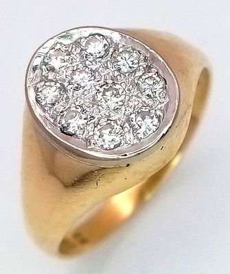 AN 18K YELLOW GOLD DIAMOND SET SIGNET RING - 0.20CTW. 4.5G. SIZE N. SC5083.