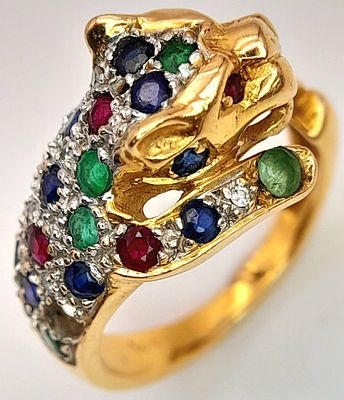 AN 18K YELLOW GOLD DIAMOND, SAPHIRE, RUBY AND EMERALD SET PANTHER RING. 4.9G. SIZE G. SC5085.