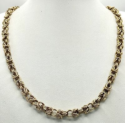 A 9K Yellow Gold Intricate Link Necklace. 48cm. 51g. Brilliantly constructed.