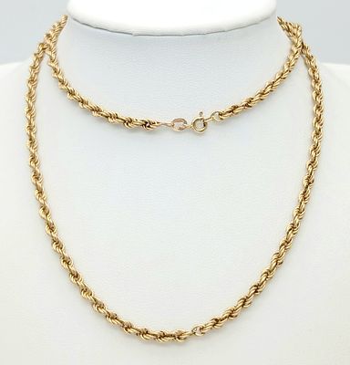 A 60cms ROPE TWIST NECKLACE CHAIN IN 9K GOLD . 7.7gms