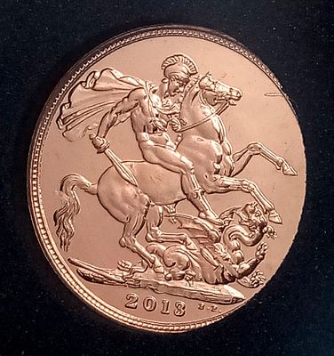 A 2013 Queen Elizabeth II Full Sovereign Proof Coin. 22k Gold. 7.98g. This is a datestamp coin. 