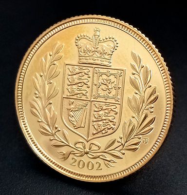 A Royal Mint 2002 Queen Elizabeth II Golden Jubilee Proof Full Sovereign Coin. Royal shield 