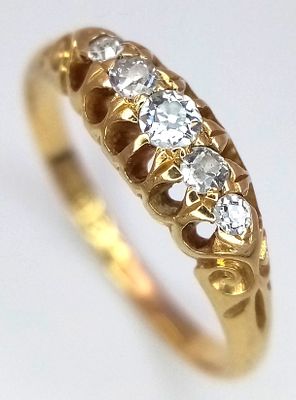 An 18K Yellow Gold Diamond Five Stone Ring. Size O 1/2. 3g. Chester hallmarks.