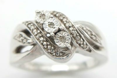 A Vintage Sterling Silver Diamond Set Open Work Ring Size L. The Ring measures 1.1cm Wide at 