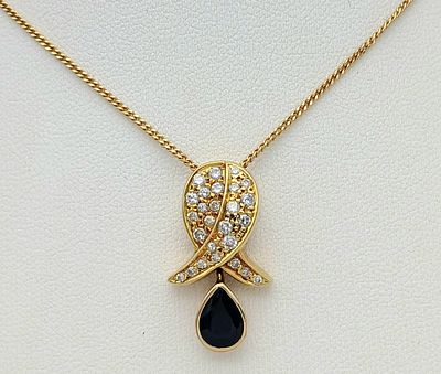 An 18K Yellow Gold, Sapphire and Diamond 'Cross my Heart' Pendant - on an 18K Gold Chain. 25mm 