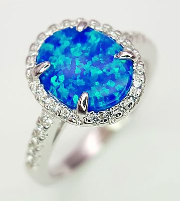 A Sterling Silver and Opalite Ring Size M. The Ring measures 1.2cm Long at the Crown. Gross 