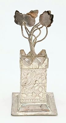 A vintage silver Tulsi plant miniature figurine. Total weight 16.1G, Height 6.5cm.