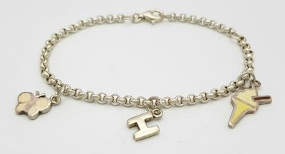 A STERLING SILVER CHARM BRACELET WITH 3 CHARMS - BUTTERFLY, INITIAL H AND AN ICE CREAM. 6.6G. 