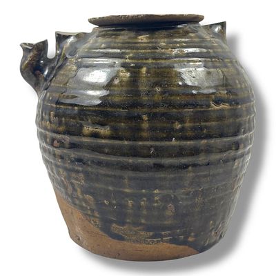 An antique Oriental celadon Glazed Ceramic Medicine Brewing Pot with Lid. Stoneware exterior 