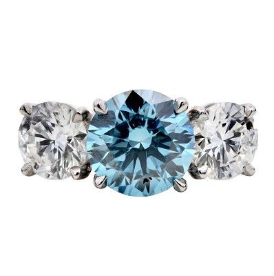 A Lab-Grown 4.54ctw Three Stone Diamond Ring - Set in Platinum. Centre blue diamond (2.51ct)VS2 