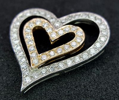 14K YELLOW AND ROSE GOLD DIAMOND SET HEART PENDANT. 0.35CTW. 2.7G. SC5064.