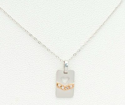 An 18K White Gold and Diamond Pendant on a 9K White Gold Chain. 1.4g total weight. Ref: 1.12.