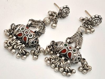 A vintage pair of silver stone set Tribal drop earrings. Total weight 15.9G. 6cm drop.