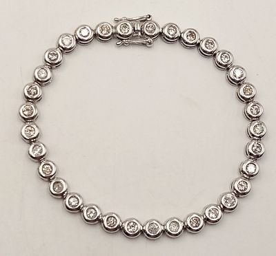 An 18K WHITE GOLD DIAMOND SET TENNIS BRACELET, APPROX 2CT DIAMONDS 14.6G. Ref: SPSA 7001