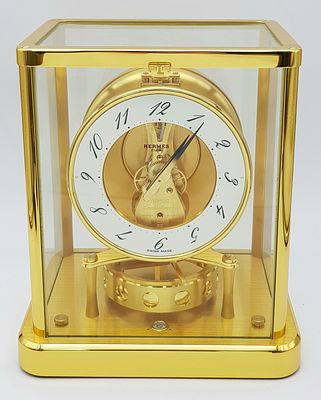 A Beautiful Jaeger-LeCoultre Hermes Gilded Mantle Clock. Atmospheric clock with white openwork 