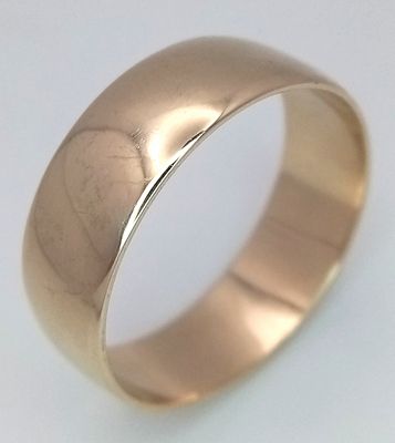 A Large 9K Yellow Gold Band Ring. 9mm width. Size Z +6. 7.7g.