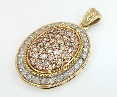 Beautiful 9 CARAT GOLD OVAL PENDANT , Absolutely Smothered in DIAMONDS. 3.6 Grams. Approx 2.8 