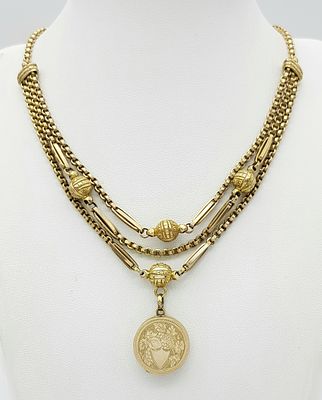 An Antique 9K Gold Albertina Watch Chain with Coin Locket Fob. 42cm. 26.05g.