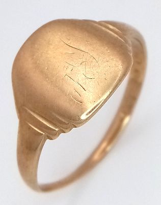 A 9K Yellow Gold Signet Ring. London hallmarks. Size T 1/2. 3.2g.
