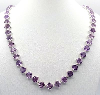 An Amethyst Gemstone Tennis Necklace. Set in 925 Silver. 44cm length. CD-2059.