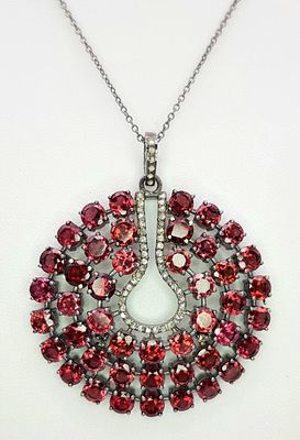 A Garnet Gemstone Large Circular Pendant. Set in 925 Silver. 5.5cm diameter. Comes with a 