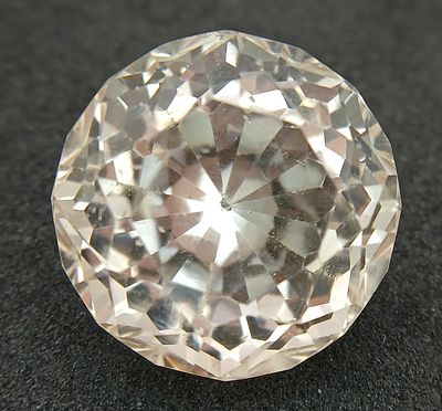 A 48.69CT NATURAL PEACH/PINK TOPAZ ROUND BRILIANT CUT . Ref: MGB 7003