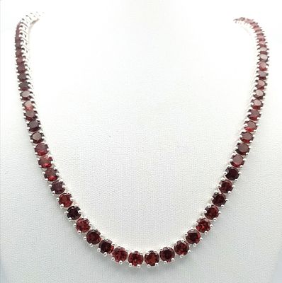 A Garnet Gemstone Tennis Necklace. Set in 925 Silver. 46cm length. CD-2062.