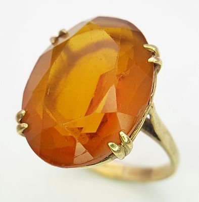 A 9K Yellow Gold Large Oval Cut Citrine Ring. Size M 1/2. 5.3g total weight.