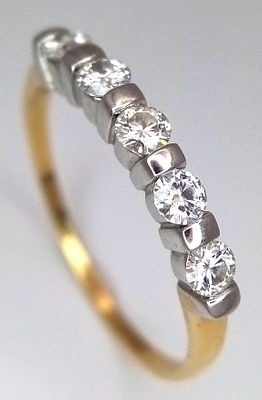 AN 18K YELLOW GOLD DIAMOND SET HALF ETERNITY RING. 0.50CTW. 2.9G. SIZE U. SC6057.