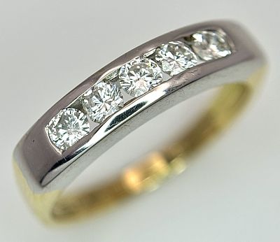 An 18K Yellow Gold Five Stone Diamond Ring. 0.50ctw of round brilliant cut channel set 