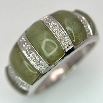An Attractive Sterling Silver Jade and Diamond Ring Size P. The Ring is set with five 