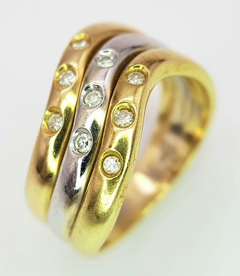 A DELIGHTFUL DESIGNER 3 COLOURED 18K GOLD RING WITH 9 SMALL DIAMONDS . 5.7gms size L