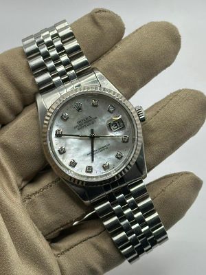 A Stainless Steel Rolex Datejust Watch. Case 36mm, Jubilee Strap, Fluted Bezel and mother of 