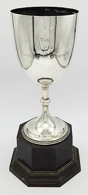 A Sterling Silver Cup Mounted on a Wood Base. Hallmarks for Birmingham 1920. Makers mark of 