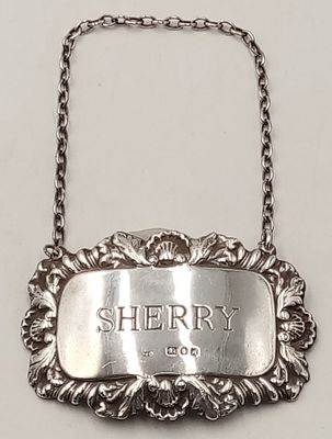 Hallmarked Vintage SILVER DECANTER LABEL for ‘SHERRY’. Having attractive ornate surround with 