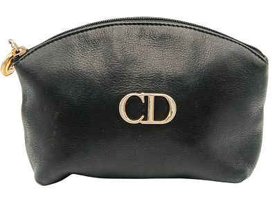 A Christian Dior Black Leather Cosmetic Pouch. Black leather exterior with gold-tone hardware 